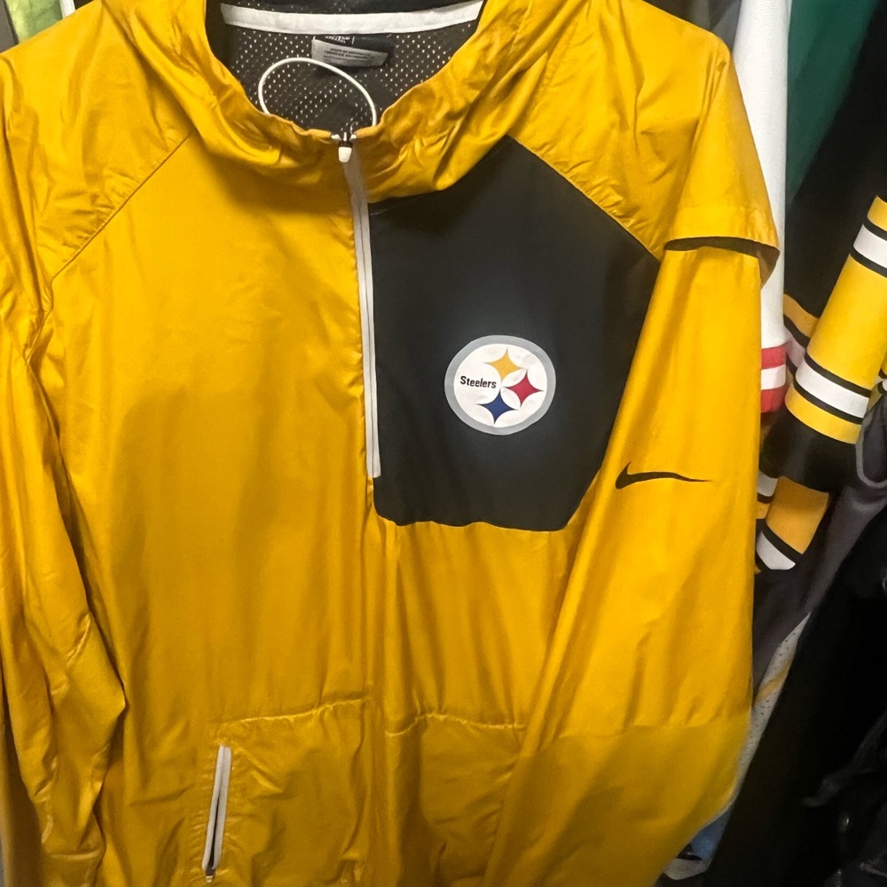 Used water resistant Steelers pullover jacket